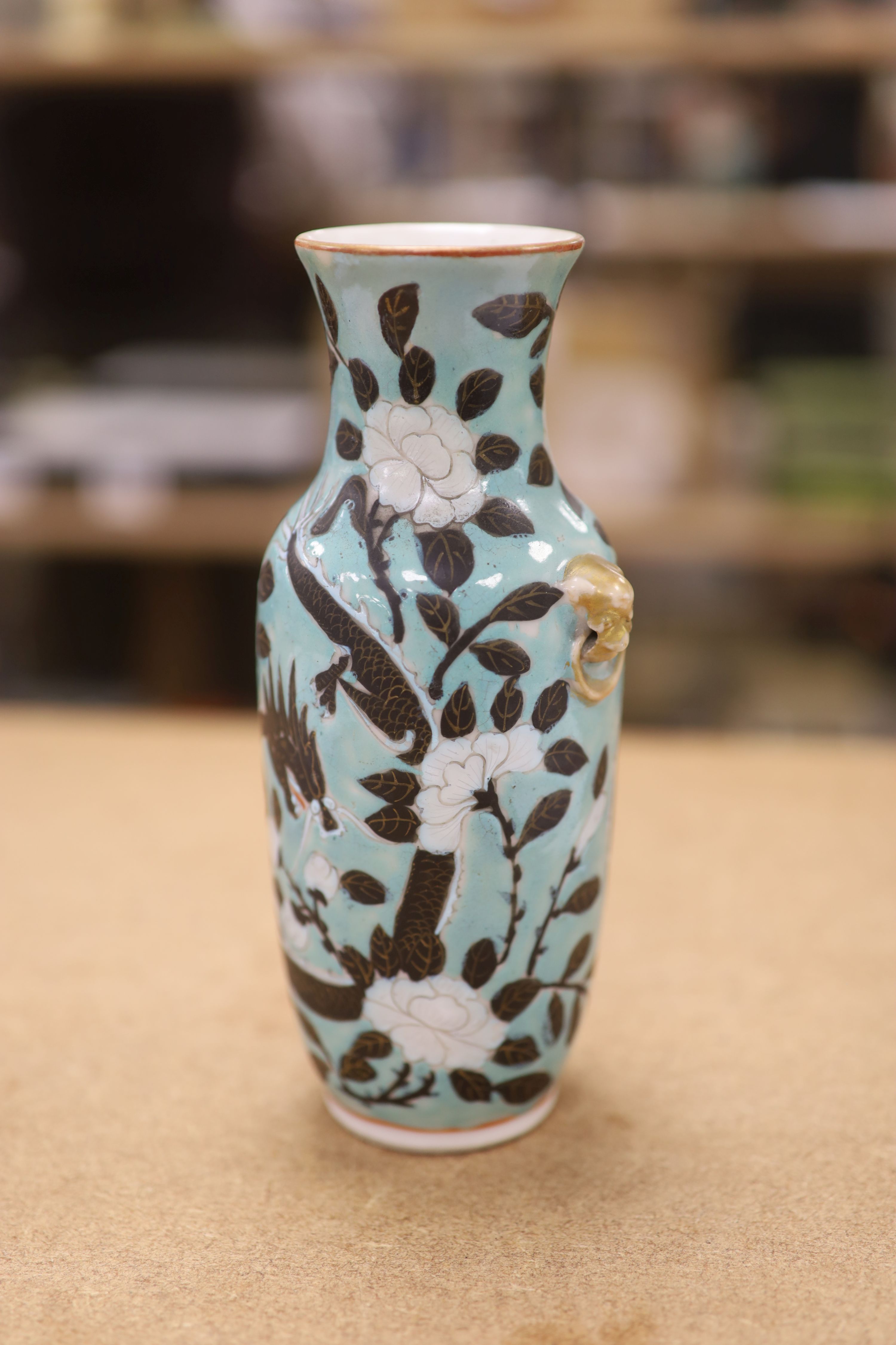 A Chinese turquoise glazed 'dragon' vase, c.1900, height 18cm